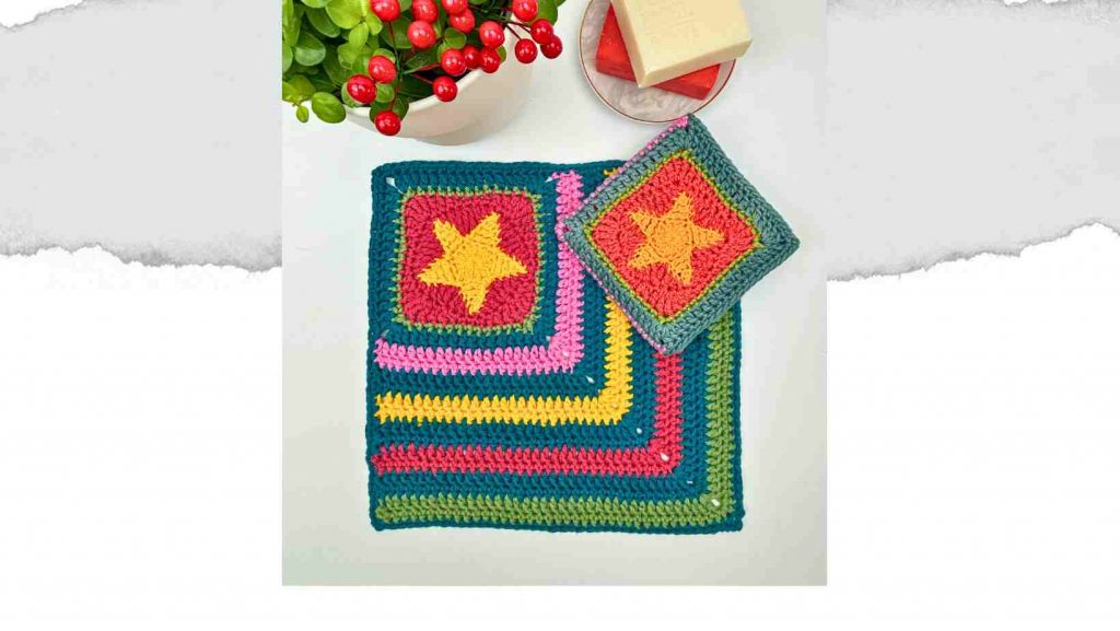 Starlight Dishcloth made from free crochet pattern in Teal blue and bright pops of yellow, pink, red and green.
